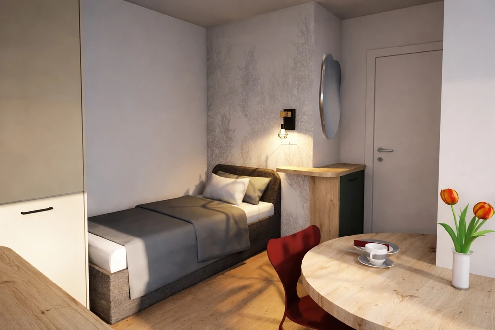 Salle de bain moderne avec meuble bas à deux tiroirs en verre laqué vert sauge, poignées chromées, plan vasque blanc