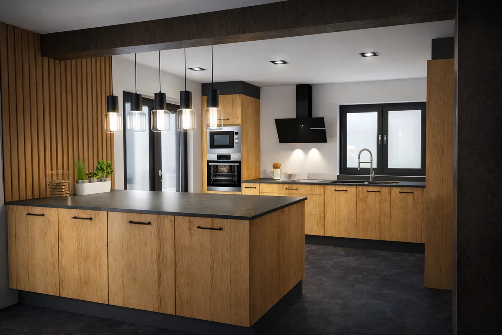 Cuisine en U moderne dans un appartement sous combles, lumière naturelle par fenêtre de toit Velux